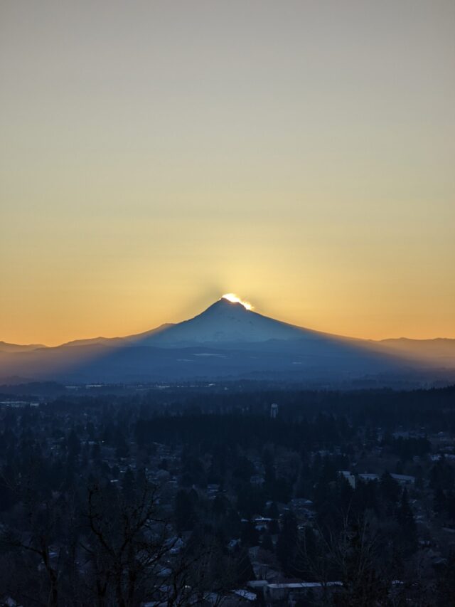 Sun Rising Behind Mount Hood