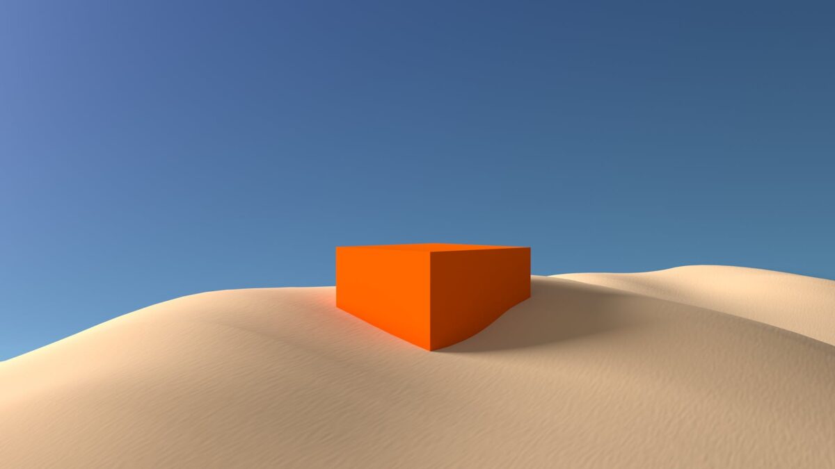 orange box on white sand